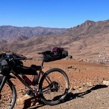 Remote wild campsite cycle touring in Africa
