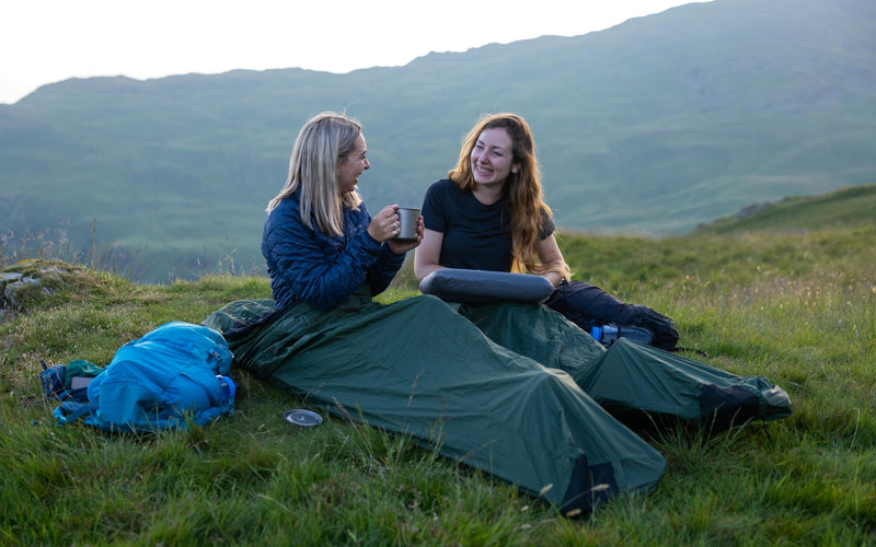 Two women bivvying in the Lake District