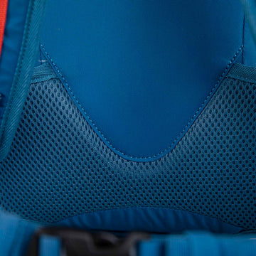 Hikers wearing different sized rucksacks atop a mountain