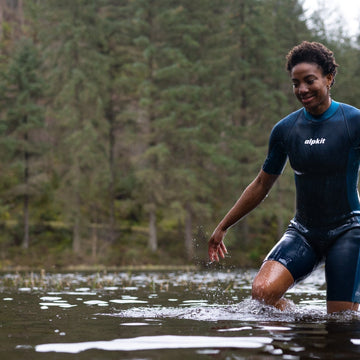 Putting on an outdoor swimming wetsuit